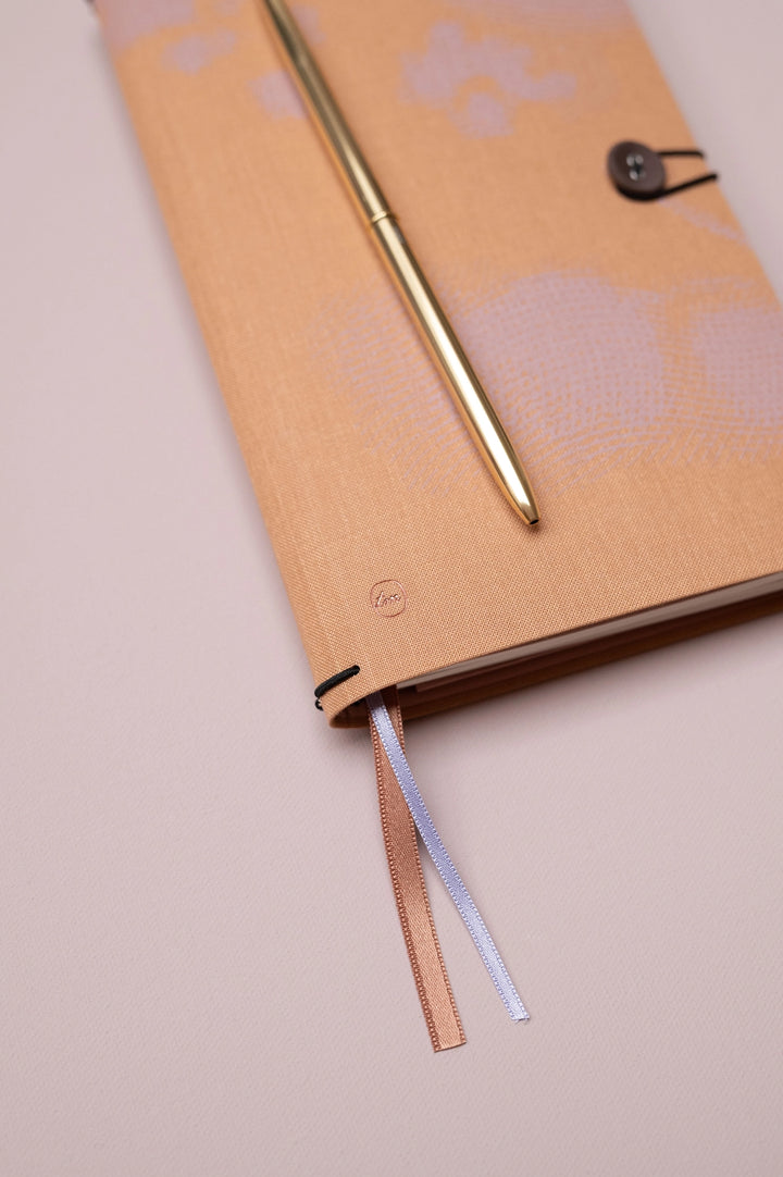 tinne mia button notebook