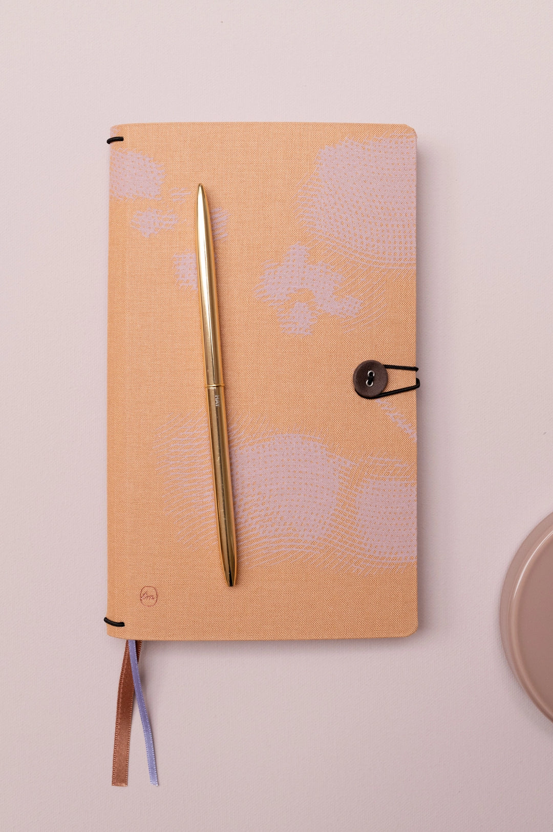 tinne mia button notebook