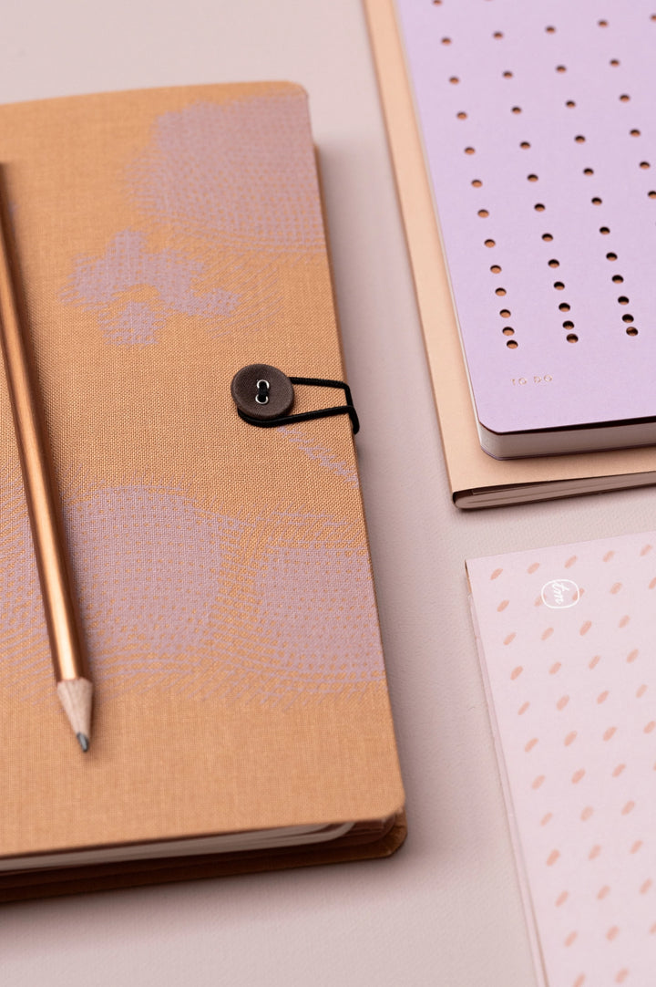 tinne mia button notebook